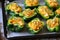 Green peppers stuffed with pumpkin. Selective focus. Macro.