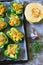 Green peppers stuffed with pumpkin. Selective focus. Macro.