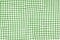 Green picnic blanket fabric with squared patterns and texture