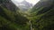 Green picturesque mountain river valley in the Caucasus mountains