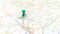 A green pin stuck in Lake Iseo on a map of Italy