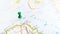 A green pin stuck in Rathlin Island on a map of Northern Ireland