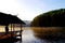 Green pine forest with camping of tourist near the lake with fog over the water in the morning, Pang oung Maehongson province nort