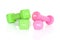 Green and pink fitness dumbbells