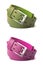 Green and pink leather belts isolated
