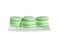 Green pistachio sweet macaroons, french traditional, cream, whi