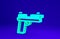 Green Pistol or gun icon isolated on blue background. Police or military handgun. Small firearm. Minimalism concept. 3d