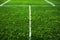 Green pitch perfection Soccer field with vibrant artificial grass texture