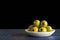 Green pitted olives with olive oil