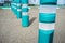 Green plastic bollards with reflective tape