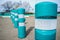 Green plastic bollards with reflective tape