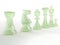 Green plastic chess pieces