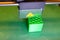 Green plastic cube 3D printed