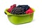 green plastic wash bowl with clothing