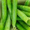 Green pod peas bean lot of vegetables. green background fresh design close-up design background