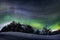 Green polar northern lights on the night purple sky