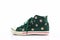 Green polka dot canvas shoe.