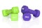 Green and purple fitness dumbbells