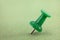 Green push pin