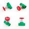 Green PVC pipe fitting with red valve handles