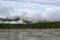 Green rainforest mountains in clouds, Amazon river basin, South America