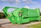 Green recycle skip with electric compressor