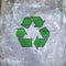 Green recycling icon on shopping plastic bags, creative environmental protection background