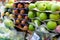 Green and red apples in a group to be sold to the consumer