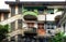 Green and red at facade building, antique flat with old architecture