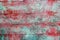 Green and red grunge aged paint wall texture