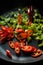 Green and red peppers for fajita in a frying pan closeup