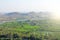 Green rice fields, palms and river Tungabhadra in the village of