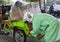 Green rickshaw, a bicicle transport three wheeler with its chauffeur