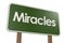 Green road sign banner with miracles word
