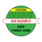 Green road sign: Deep Forest Zone. Drive slowly for animal safety.