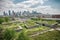 green rooftops with view of the city skyline, showing how green buildings can blend into urban surroundings