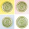 Green round ceramic plate with spiral pattern