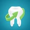 Green Ð°rrow protected human teeth on blue background