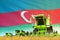 green rural agricultural combine harvester on field with Azerbaijan flag background, food industry concept - industrial 3D