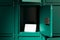 Green Safe Deposit Boxes With One Opened Locker And Blank Folded Paper. 3d rendering.