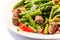 Green salad with asparagus and Italian Salsiccia