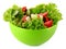 Green salad, cucumber and tomato in green plate