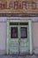 Green saloon door of the Micca House in Paradise Valley, Nevada.