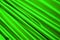 green satin textile, wavy fabric texture closeup, modern fashion interior, decoration style, dressing room,