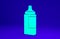 Green Sauce bottle icon isolated on blue background. Ketchup, mustard and mayonnaise bottles with sauce for fast food