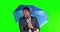 Green screen, business and black man sneeze with umbrella for rain, winter season and bad weather. Health problem