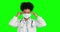 Green screen doctor, covid and woman with face mask for virus safety, medical healthcare or hospital security policy