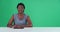 Green screen, face and woman in broadcast, talk show presenter and journalist in mockup newsroom. Portrait of black