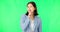 Green screen, happy woman and secret wink of face, finger on lips and business privacy. Portrait of female model