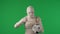 Green screen isolated chroma key photo capturing a mummy throwing a soccer ball, football from hand to hand, giving a